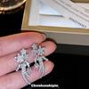 Brincos de zircão de nicho elegante de luxo leve e luxuoso Meteoro de meteoro de alta qualidade sem orifícios para a orelha Brincos de placa de incenso de mosquito requintados requintados femininos
