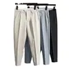 Pantalones de traje para hombre, corte entallado, rectos, antiarrugas, sin planchado, informales, de negocios, de alta calidad, negros, con dosificación recortada.