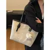 Bolsa Feminina Tendência 2025 Nova Moda Versátil Ombro Transversal Bolsa Tote para o Dia a Dia Design de Nicho de Alto Padrão