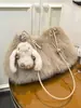Yozzi 2026 principios de otoño nuevo versátil casual simple peludo moderno elegante bolsa de hombro para axila de gran capacidad