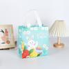 Bolsa de regalo de tela no tejida con diseño de huevo y conejo de la serie de Pascua, impermeable y con revestimiento, venta al por mayor