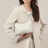 Bolso de mano para mujer 2026 nuevo otoño/invierno bandolera hobo para debajo del brazo con un toque de alta gama, estilo cruzado y tote