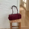 Bolso baguette de nicho de alta gama nuevo para 2026, bolso de hombro o axila simple y versátil, bolso de mano para mujer para el trabajo
