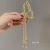 Pinza de Tiburón Grande para el Cabello Estilo Japonés y Coreano Fresco y Dulce de Aleación con Borla Pinza de Garra para la Parte Posterior de la Cabeza Accesorio para el Cabello Primavera 2025