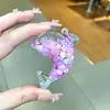 Nuevo llavero de muñeca de delfín con arena movediza relleno de aceite, colgante para mochila, decoración para bolso de pareja, regalo pequeño para venta al por mayor