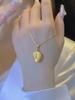 Electrochapado de Oro Real Diseño de Moda de Nicho Sentido Colgante de Durian Collar Celebridad de Internet Femenina Elegante Lujo Ligero Cadena de Cuello Olvidada de Durian