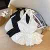 Verano Dulce Sentido del Diseño Ceñidor de Cintura Adelgazante Lunares Top Camisola Mujer 2026 Nuevo Sentido del Diseño Lunares Azules