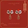 Pendientes de felpa de danza del león de moda para mujer, nuevo estilo 2026, aspecto de alta gama, perfectos para invierno.