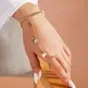 Accesorios de Pulsera Creativos Elegantes de Nicho Europeos y Americanos para Mujeres Pulsera Esclava de Moda Cadena de Cuentas de Circonita Cúbica Pulsera para el Dedo