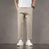 Pantalones casuales de algodón para hombre, estilo nuevo primavera/verano, corte ajustado, ligeramente cónicos, versión holgada, disponibles en opciones de largo completo