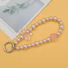 Cadena para teléfono con lazo estilo chica dulce y perla, con cierre de resorte, correa de muñeca desmontable, llavero para bolso, accesorio para funda de auriculares