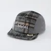 Al por mayor Otoño 2026 Lana Cálida Gorra de Pato para Bebé Estilo Coreano Serie a Cuadros para Niños y Niñas Sombrero de Ala Suave de Moda para Bebé