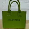 Bolsas de fieltro personalizadas para el Festival de Medio Otoño para eventos festivos, reuniones anuales corporativas, bolsas de fieltro lindas al por mayor, bolsas para bebés de mes completo y de un año