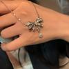 Exquisito collar de lazo para niñas en línea, popular diseño de cadena de suéter, nicho de cadena de clavícula femenina 2022 Nuevo