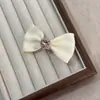 Accesorios para el cabello de seda de leche lazo pinza lateral Mori pinza lateral femenina Corea del Sur Nuevo pasador pasador tridimensional Nuevo