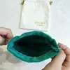 Nueva bolsa de almacenamiento de terciopelo de alta gama para cosméticos y labiales, bolsa larga de felpa color verde oscuro con cordón, bolsita de terciopelo con cordón