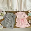 Conjunto de Dos Piezas para Niña de Verano 2026, Nuevo y Elegante, con Cuello Polo, Lindo Top de Manga Corta y Shorts/Falda, de Moda