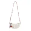 Bolso único con forma de cuerno para mujer, nuevo modelo 2026, bolso cruzado de alta gama para verano para teléfono móvil, bolso de axila para ir al trabajo
