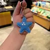 Llavero Creativo de Piel Sintética con Forma de Estrella Colgante para Bolso Regalo Exquisito para Parejas Llavero de Coche Venta al por Mayor
