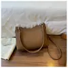 Comercio Electrónico Transfronterizo Más Vendido Nicho Retro Bolso de Axila Nuevo para Mujer Gran Capacidad Versátil para el Trabajo Bolso de Hombro Cruzado