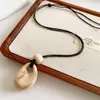 Collar de Cordón de Cera con Cuentas de Gota de Agua Colgante Largo Estilo Étnico Vintage Cadena para Suéter Joyería Versátil de Nicho para Mujeres con un Toque de Alta Gama
