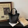 Bolsa de tela de nailon para mujer, gran capacidad, 2026 nueva primavera-verano, bolso de mano versátil y lindo de dibujos animados, bolso de hombro fresco y elegante