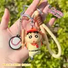 Muñeca de Crayon Shin-Chan de Estilo Clásico de Venta Caliente Nueva y Genuina con Hebilla de Correa de Mano Colgante para Bolso de Pareja de Moda Pequeño Regalo