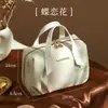 Nova Bolsa de Maquiagem Estilo Chinês para Mulheres 2026 Novo Modelo de Alta Qualidade Grande Capacidade Bolsa de Armazenamento de Cosméticos Essencial de Viagem Portátil Super Popular