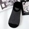 Calcetines invisibles de malla para primavera y verano tipo barco calcetines de rayas de arroz calcetines invisibles de silicona para hombre fabricantes al por mayor