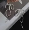 Pendientes Irregulares de Metal con Lazo de Moda Europea y Americana de Lujo Ligero y Nicho de Gama Alta