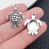 Colgante Serie Océano Plateado Xizang Estrella de Mar Delfín Caracola Tortuga Colgante DIY Llavero Accesorios de Joyería Amazon