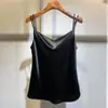 Elegante camisola de encaje de alta gama para mujer, primavera y verano, holgada, moda, satén de seda, interior, cuello en V, sin mangas, top de moda