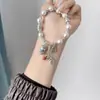 Pulseira de contas budistas segura para bebê com design de nicho estilo nacional vintage para mulheres, joia simples versátil para transporte, atacado