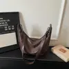 Bolsa de Axila Estilo Retro Dumpling para Mulheres 2026 Nova Coleção Primavera/Verão Bolsa Padrão Trançado para o Dia a Dia Bolsa Transversal de Ombro de Nicho