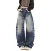 Pantalones unisex YKK retro americano lavados con diseño de salpicaduras azules desgastados, holgados, de alta costura, con corte curvo