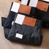 Pantalones finos de Tencel para hombre de verano color gris oscuro transpirables suaves de algodón elásticos cómodos de cinco bolsillos rectos de negocios casuales