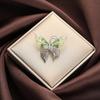 Nuevo broche de rosa de aleación de diamantes europeo y americano, diseño de personalidad elegante de alta gama, pin de planta, ramillete al por mayor
