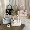 2026 Nova Moda Estilo Coreano Nicho Bolsa de Mão Bolsa Saco High-End Versátil para o Dia a Dia Ombro Único Transversal Bolsa Feminina
