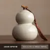 Fábrica Beige Ru Kiln Lata de Té Cerámica China Té Sellada Lata de Almacenamiento a Prueba de Humedad Exquisita