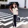 Nueva Camiseta de Verano Moderna y Elegante para Niños Conjunto Casual de Dos Piezas para Niñas Atuendo de Verano con Mangas Cortas para Niñas 2026