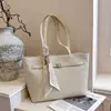 Bolso de mujer de gran capacidad, nuevo otoño 2026, moda casual, patrón de lichi, bolso tote para el trabajo, bolso de hombro versátil