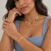Collar de joyería de hueso de serpiente de doble capa de estilo europeo y americano para mujer, cadena fina versátil, cadena de suéter, collar de traje de hip-hop, joyería