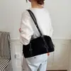 Bolsa de axila retrô de nicho de alta qualidade transfronteiriça bolsa feminina nova versão coreana bolsa de ombro casual para o dia a dia bolsa Boston