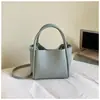 Bolsa estilosa de alta capacidade para mulheres, novo modelo de verão 2026, bolsa de ombro e transversal texturizada para o dia a dia, bolsa tipo balde da moda