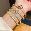 Pulsera de Broche de Hoja con Circonita Galvanizada en Oro Real de 18 Quilates, Moderna y Versátil para el Trayecto Diario, Joyería de Lujo Ligero de Alta Gama para Mujeres