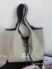 Bolsa de Lona para Mujer Gran Capacidad 2025 Nuevo Otoño e Invierno Versátil Simple Bolso de Hombro Casual para Estudiante Universitario Bolsa de Mano para Clase