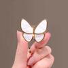 Broche delicado de alta calidad al por mayor de fábrica para mujer, temperamento de Corea del Sur, ramillete de mariposa de alta calidad, accesorios de hebilla con alfiler de perla que combinan con todo