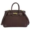 Nuevo modelo Otoño 2026, lujo ligero, elegante, bolso de mano para uso diario, bolso tipo Kelly para mujer de oficina, bolso de hombro