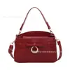 Bolso de mano de moda estilo coreano, nueva colección otoño 2026, bolso de mujer con un fresco diseño de lazo, elegante bolso de hombro y bolso cruzado