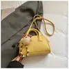 Nova Tendência da Moda Bolsa de Mão Feminina PU Cor Sólida Versátil Viagem Batom Maquiagem Bolsa de Ombro Único Transversal Transfronteiriço